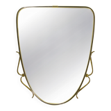 Elegant wall mirror in brass and black from the mid-century, Italy, 1950s.