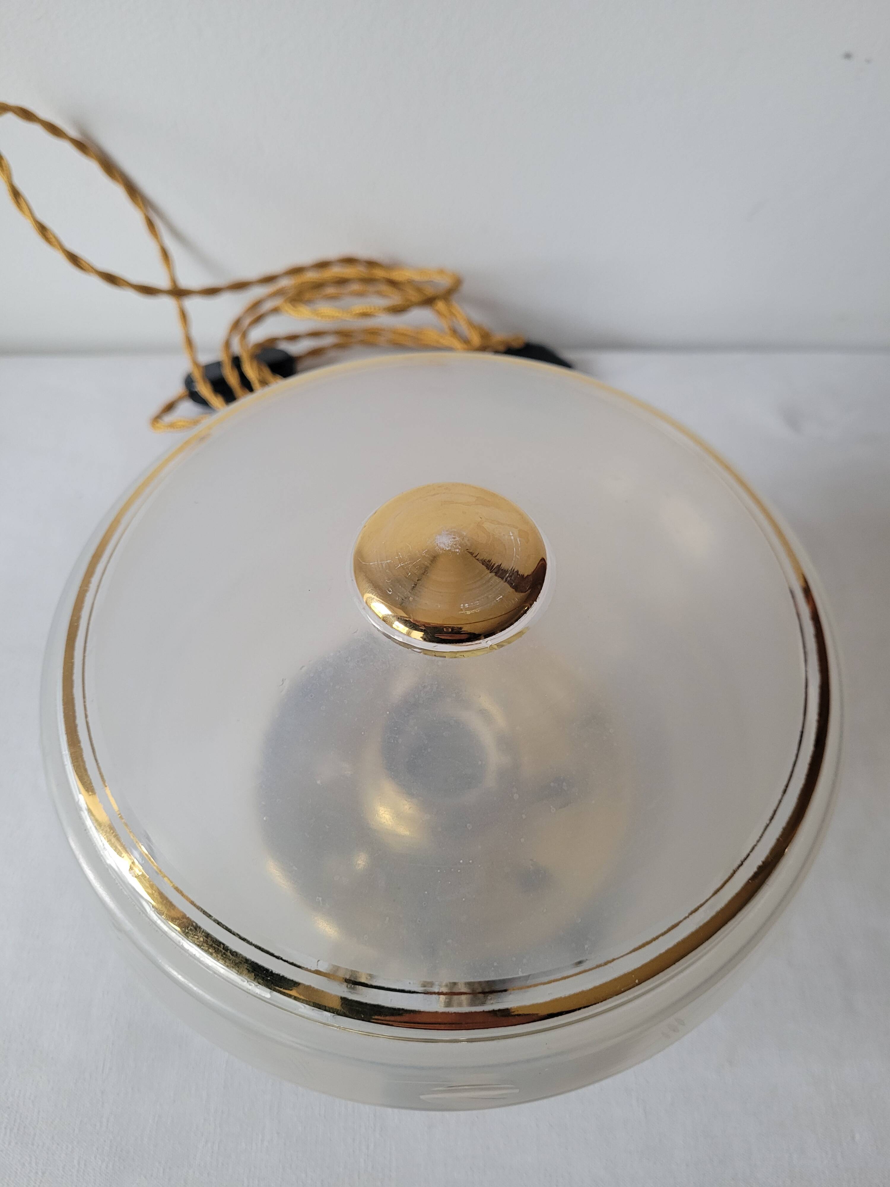 Brass and frosted glass lamp