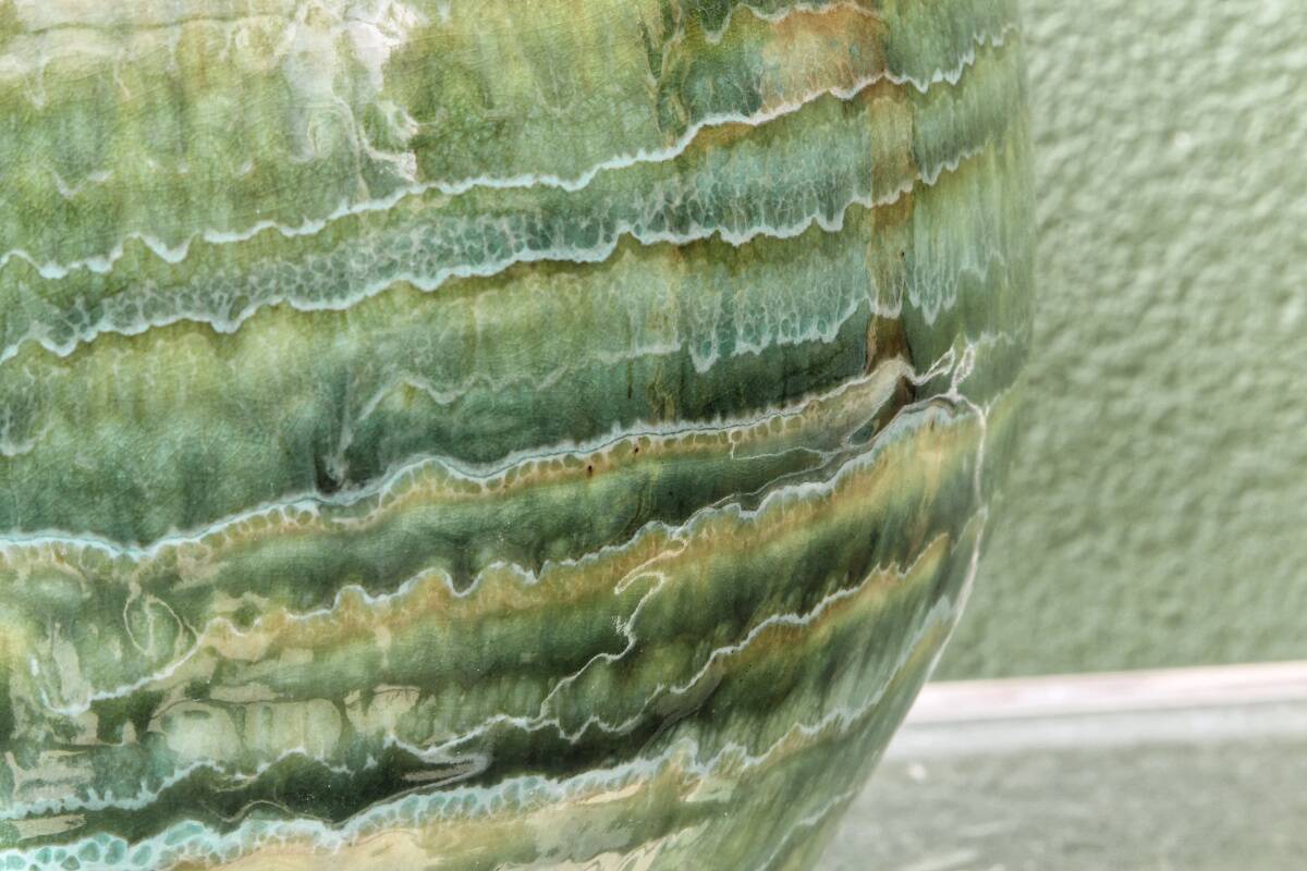 Glazed ceramic ball lamp base, green gradients.