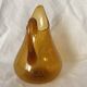 Blown glass jug with caramel bubbles