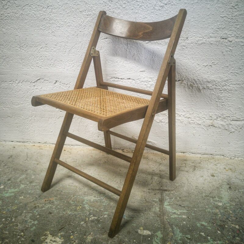 Folding chair with canned seat