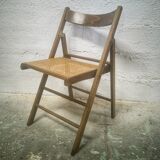 Folding chair with canned seat