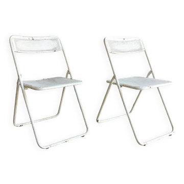 Pair of white perforated metal folding chairs - vintage