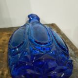 Bouteille bleue cobalt style flacon de parfum