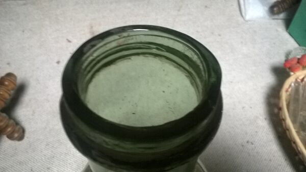 Bouteille ancienne en verre soufflé