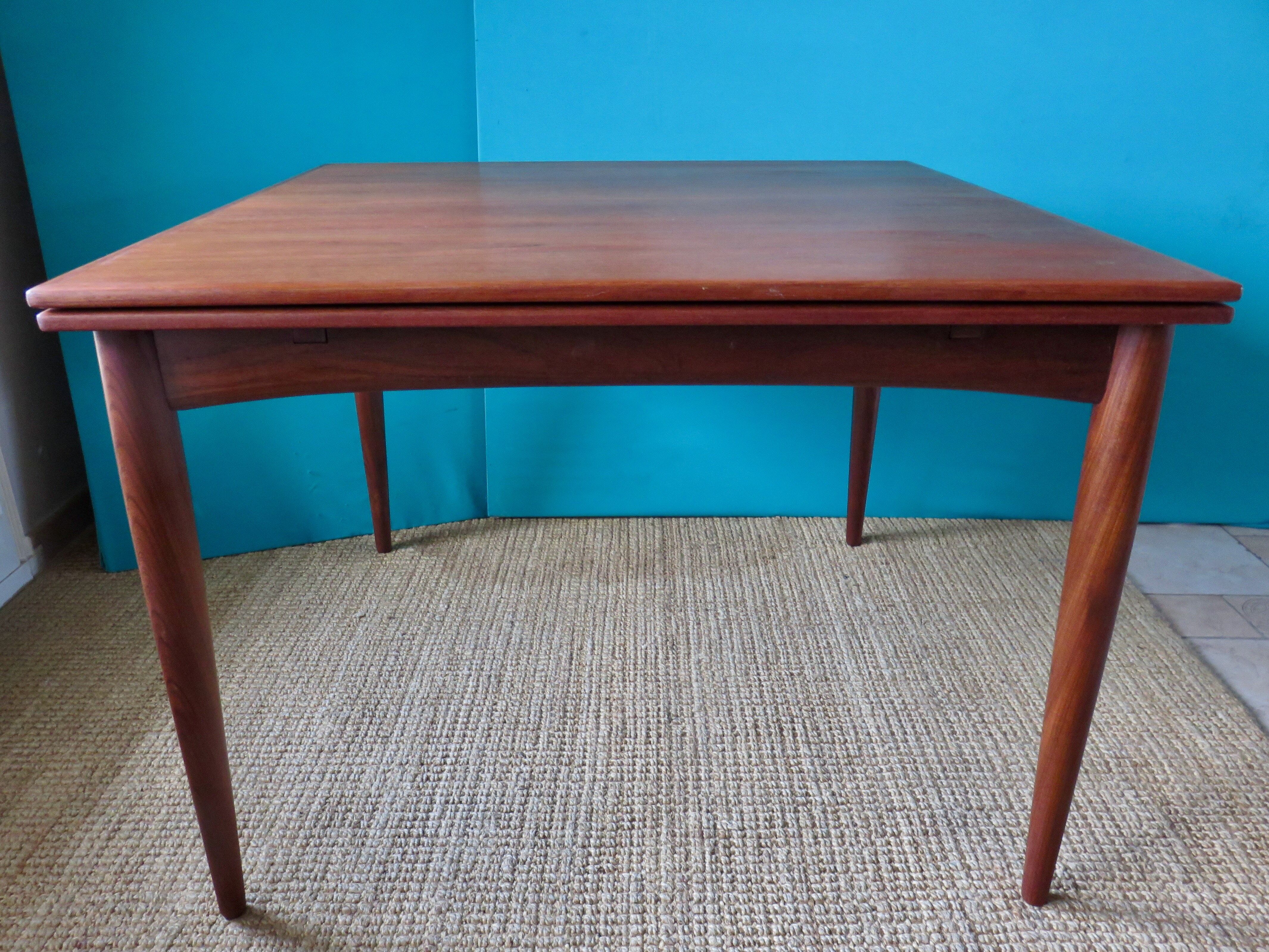 Square table in teak with extensions. Denmark 1960