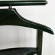 Vintage children's room valet in green varnished wood on roulette