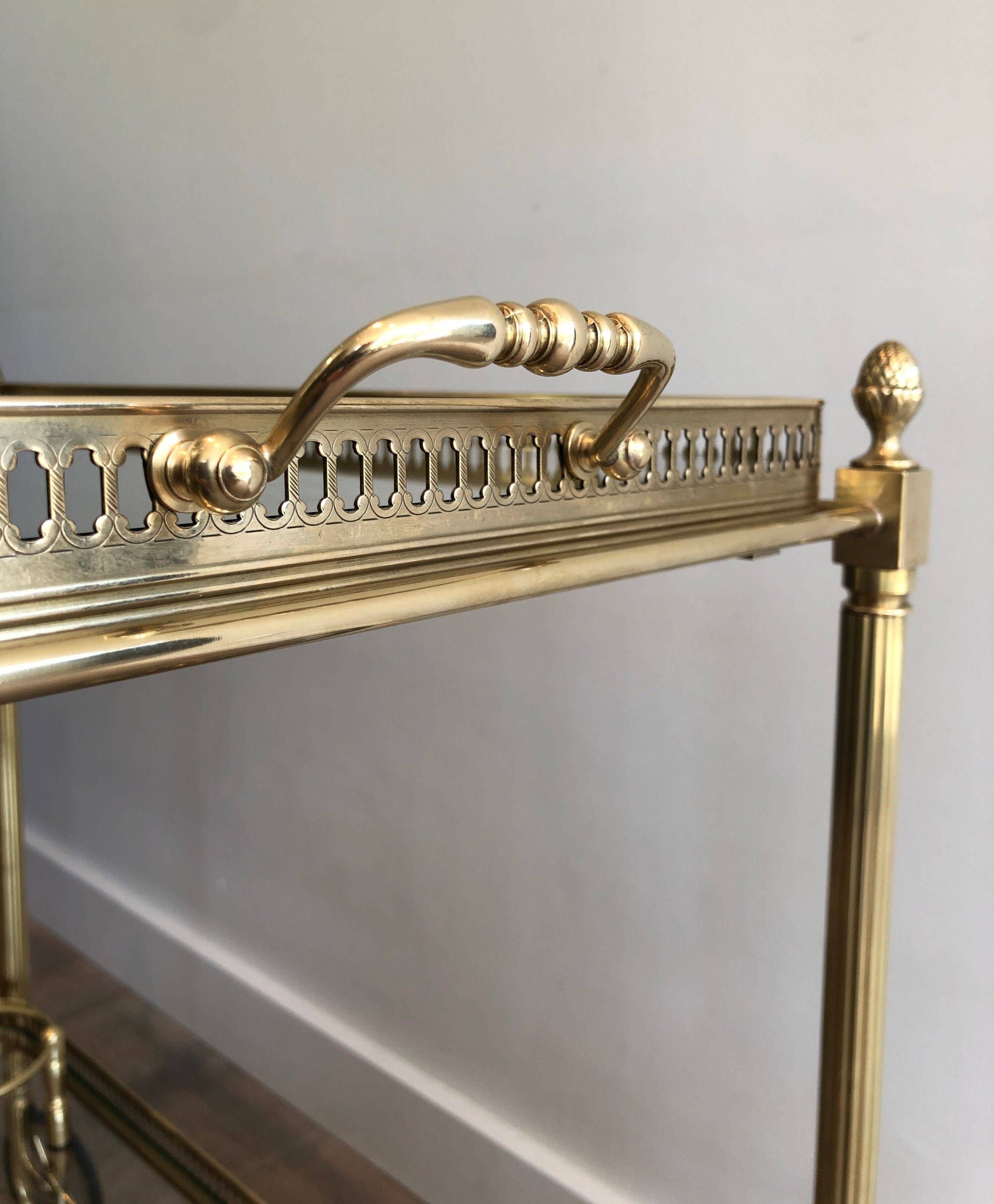 Brass rolling table with removable double trays from Maison Jansen.
