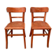 Pair of wooden bistro chairs with orange patina, 1950s
