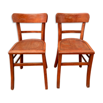 Paire de chaises bistrot en bois avec patine orangée 1950