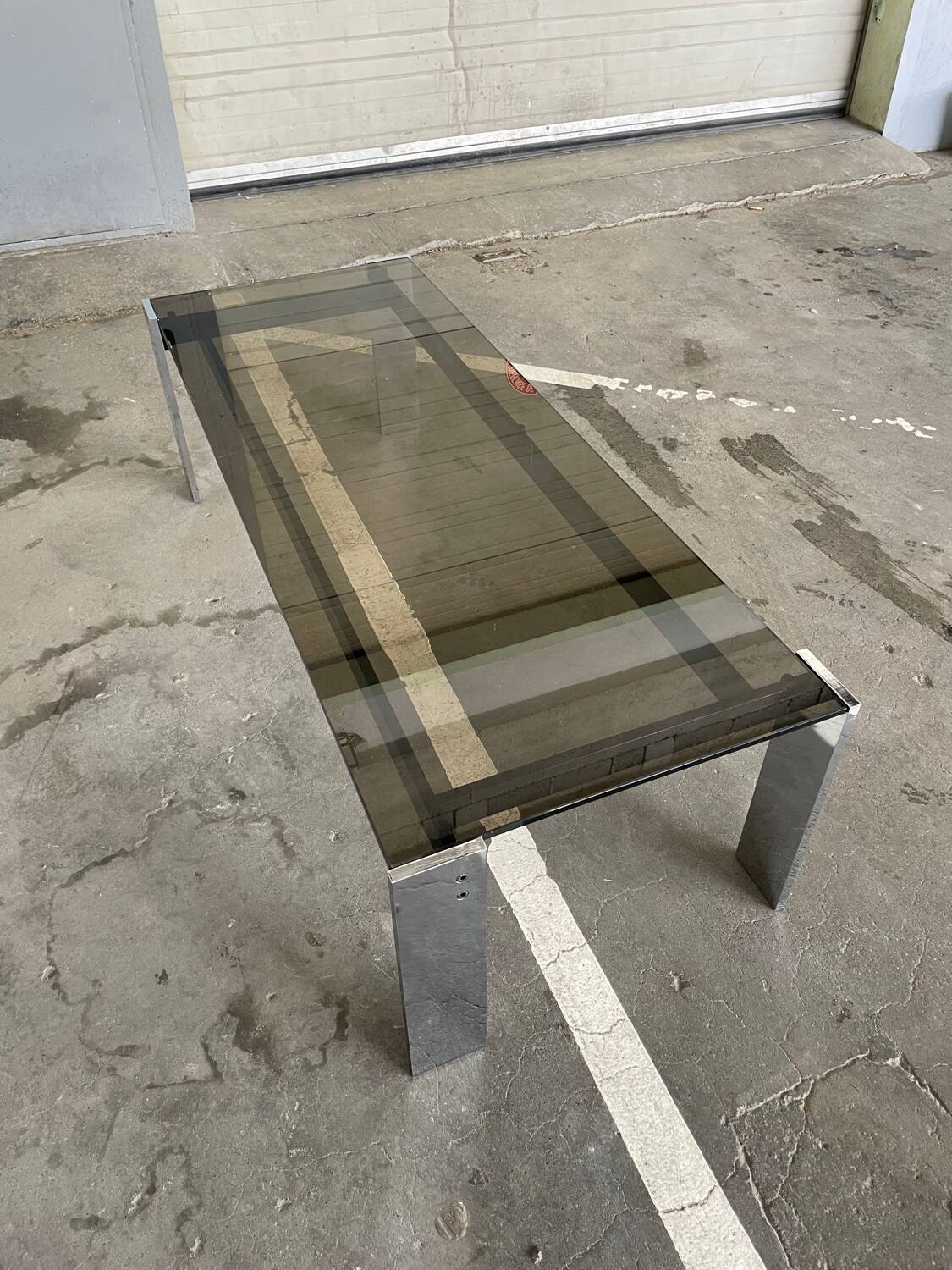 Chrome-plated steel coffee table with tempered smoked glass top