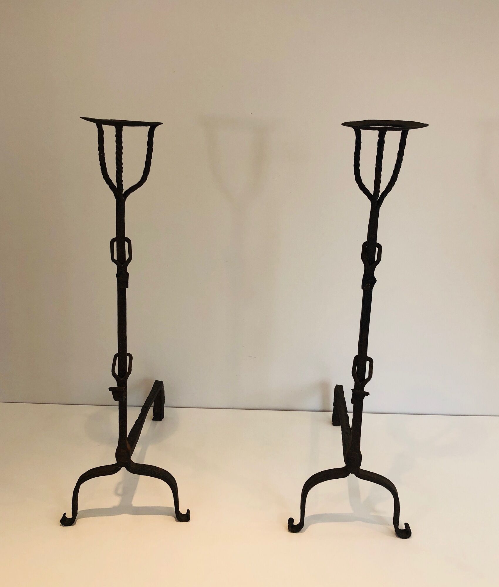 Pair of wrought iron landiers. french work ,seventeenth century