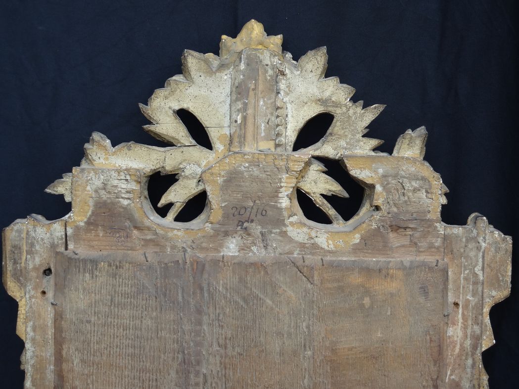 Louis XVI period mirror in gilded carved wood