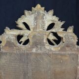 Louis XVI period mirror in gilded carved wood