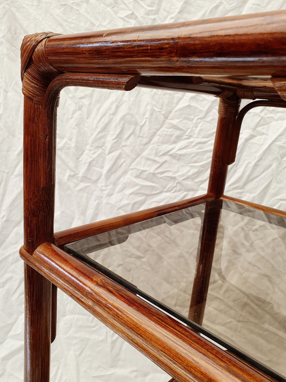 Rattan and smoked glass side table