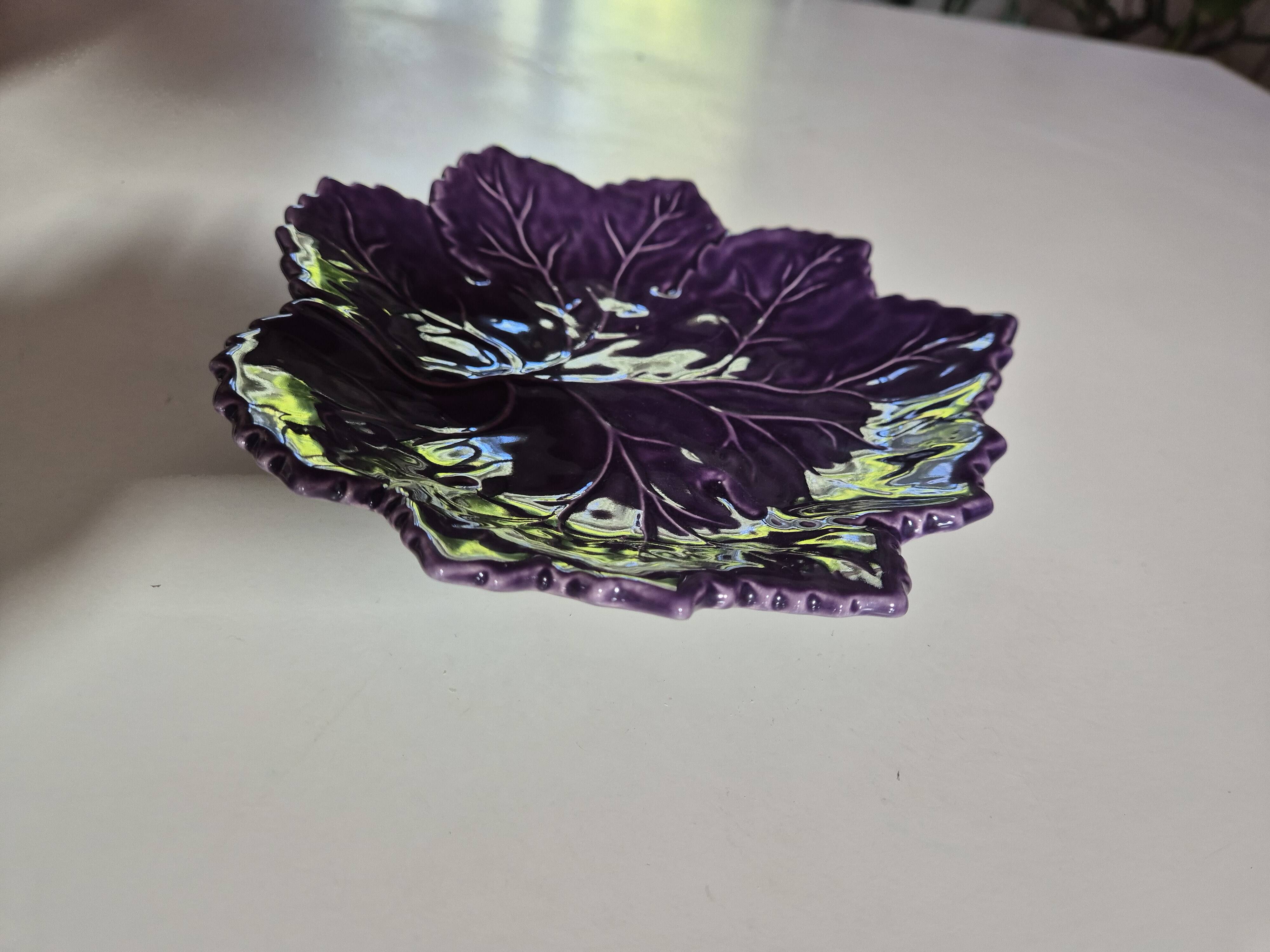 purple ceramic bowl in the shape of a tree leaf