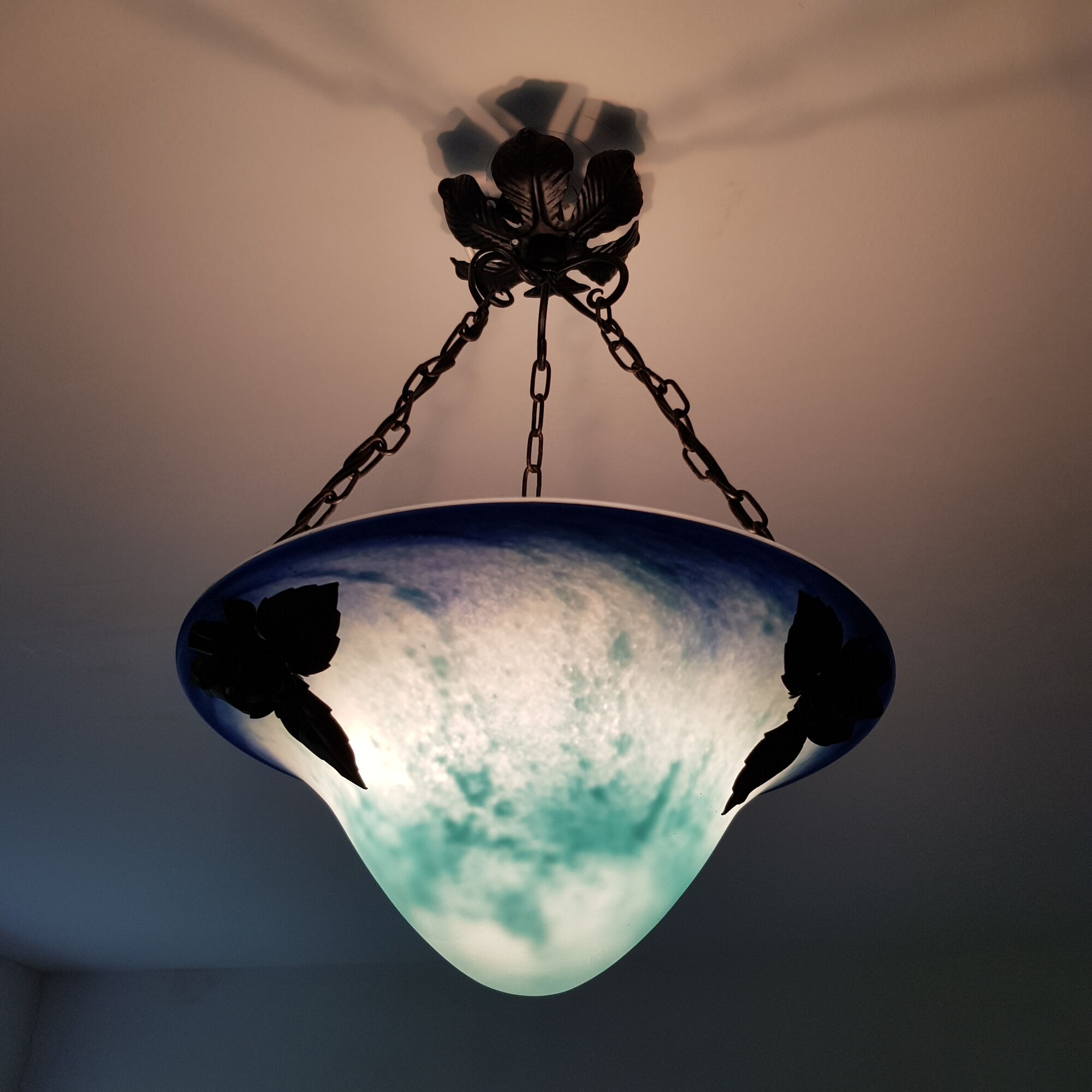 Blue glass paste and wrought iron basin suspension