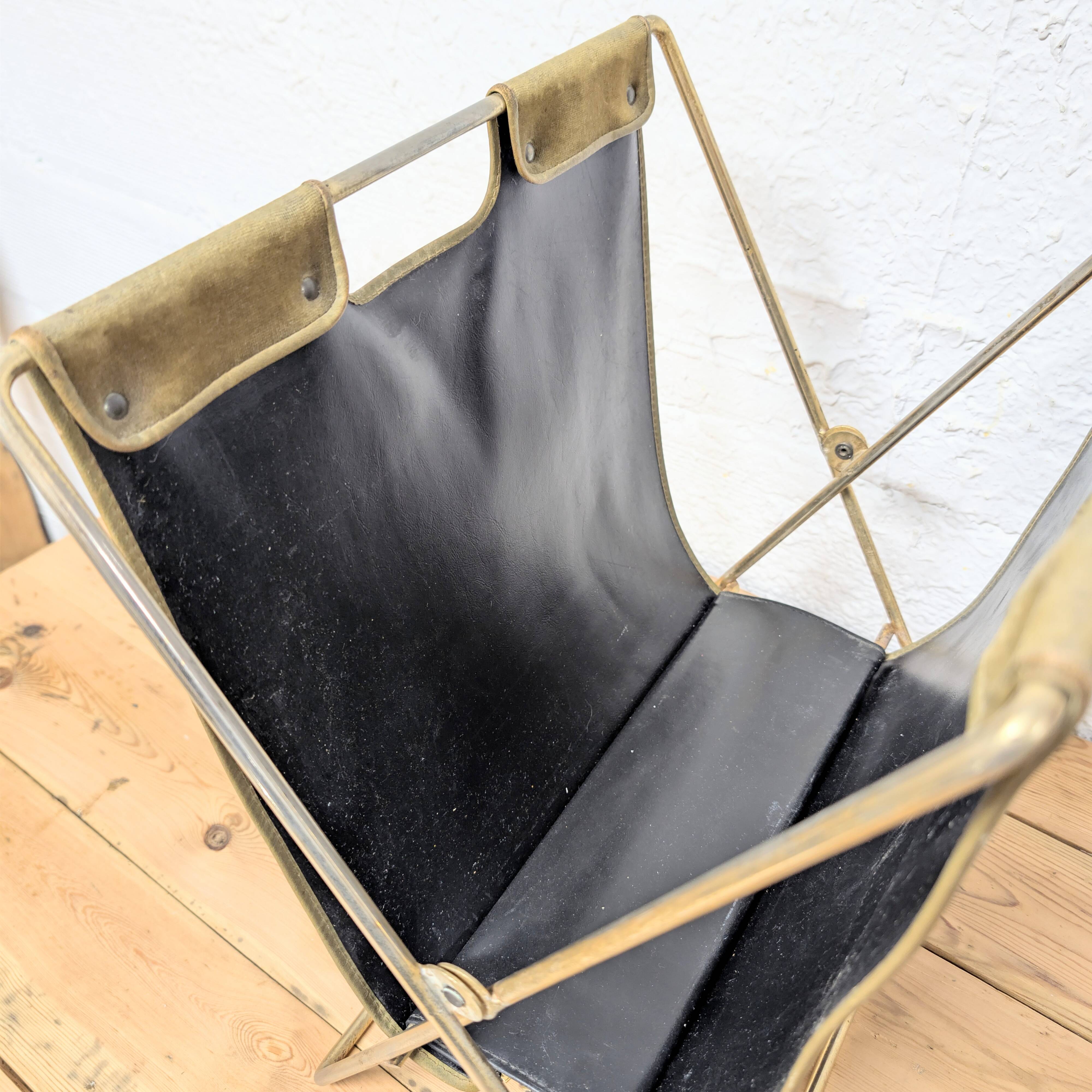 Brass and velvet magazine rack