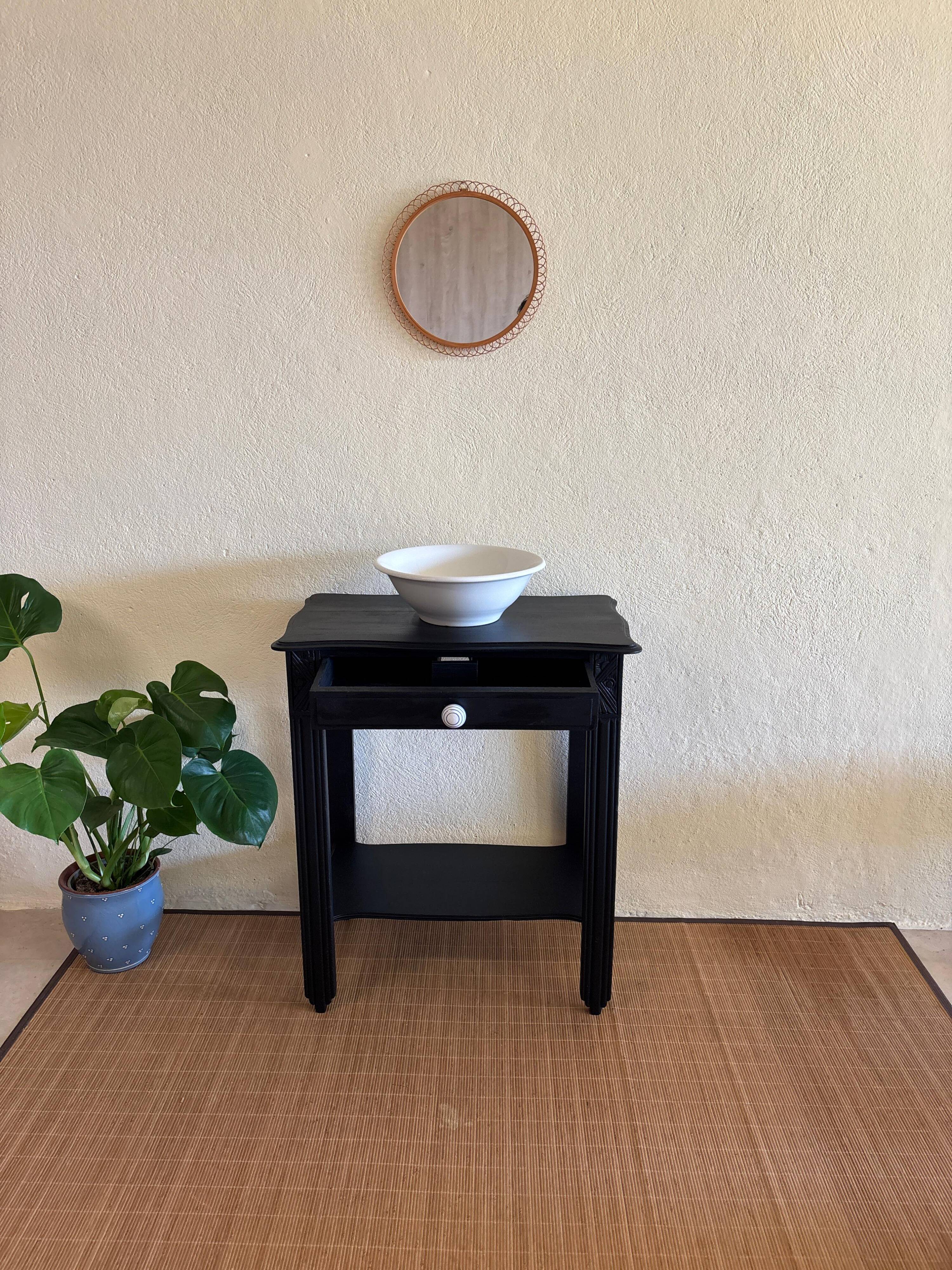 Small Art Deco console reinterpreted – matte black wood with drawer