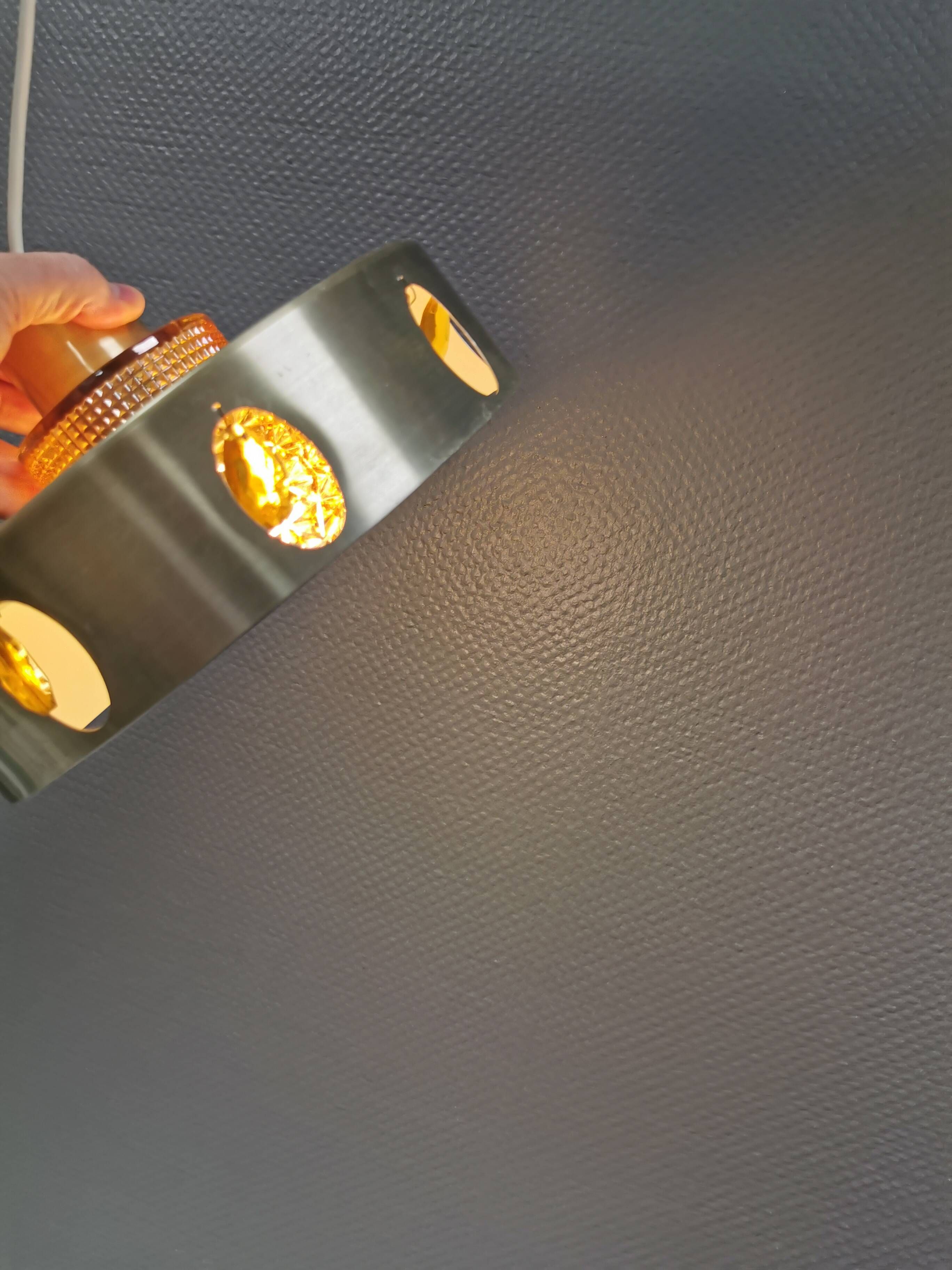 Danish hanging lamp made of glass, metal and with amber colored prisms