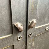 Old wooden locker with black patina