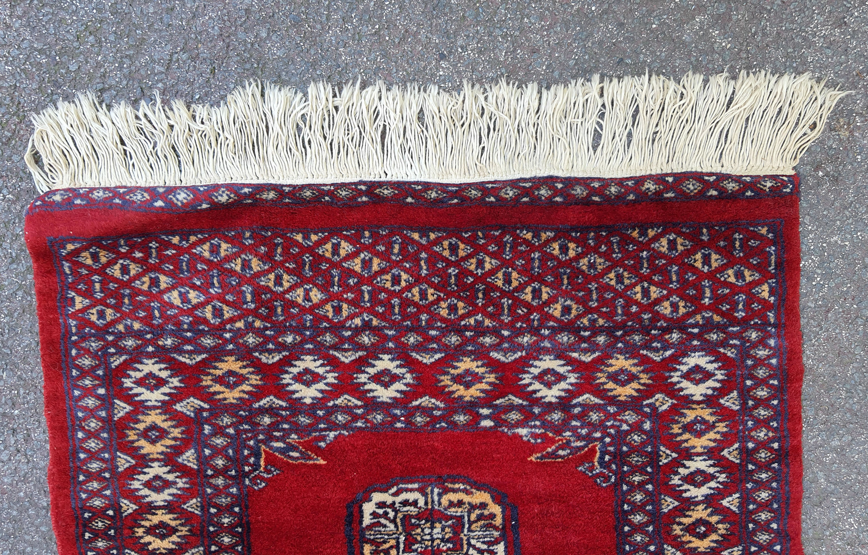 Handmade wool carpet Bukhara Pakistan 118x 61 cm