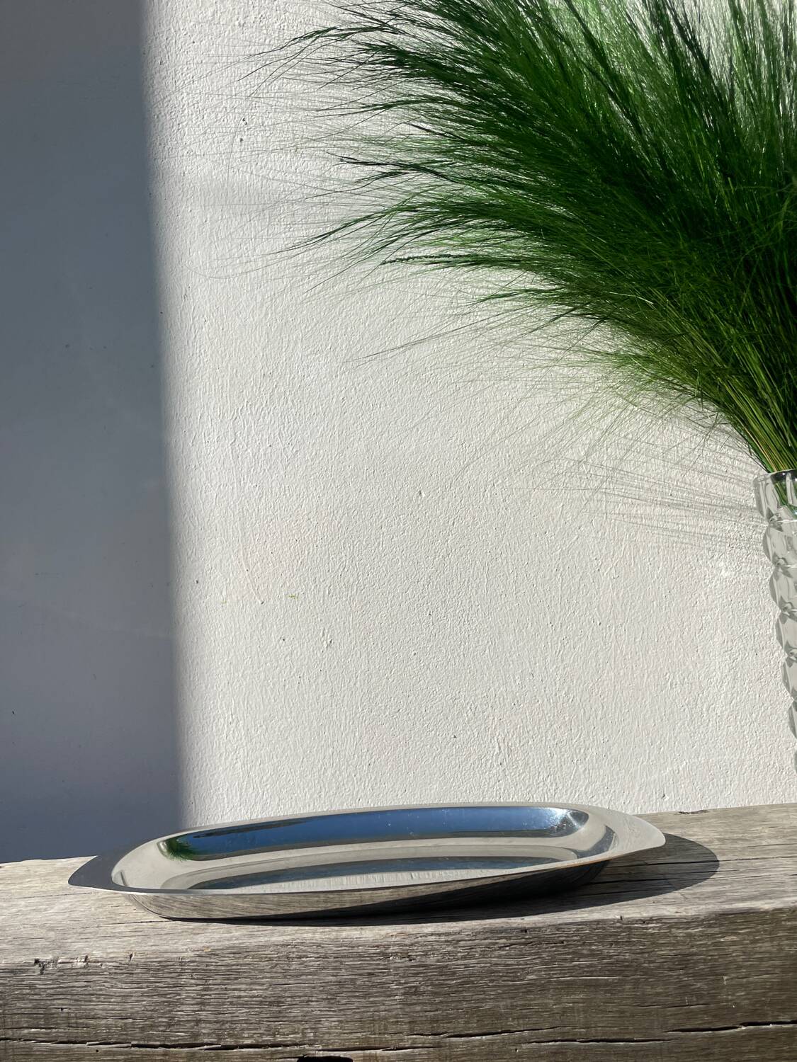 Oval stainless steel dish signed Rémi Letang