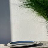 Oval stainless steel dish signed Rémi Letang