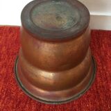 Old copper pot-cover