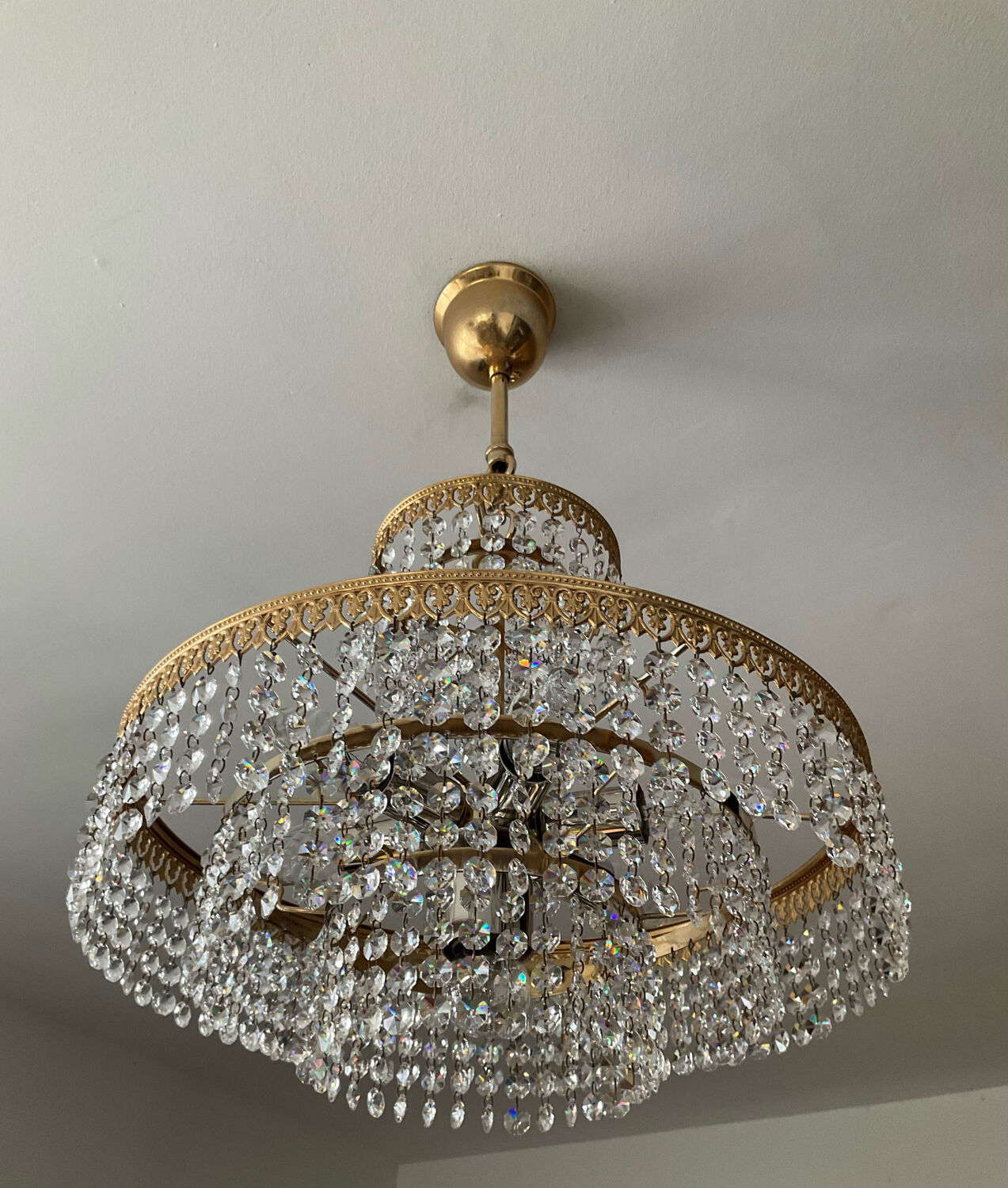 Brass chandelier and crystal tassel waterfall