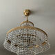 Brass chandelier and crystal tassel waterfall