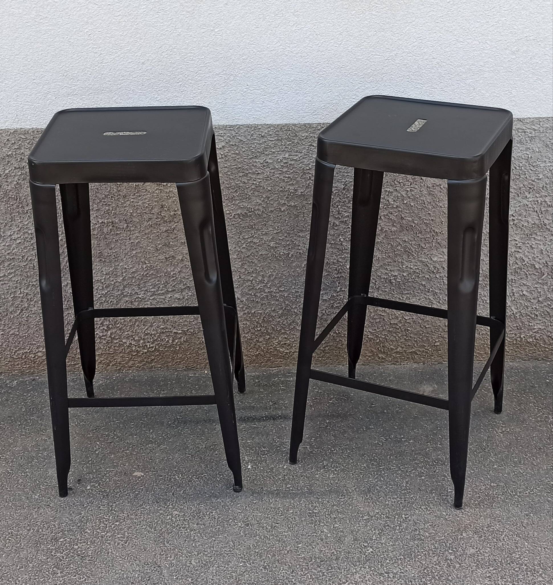 Pair of black metal stools