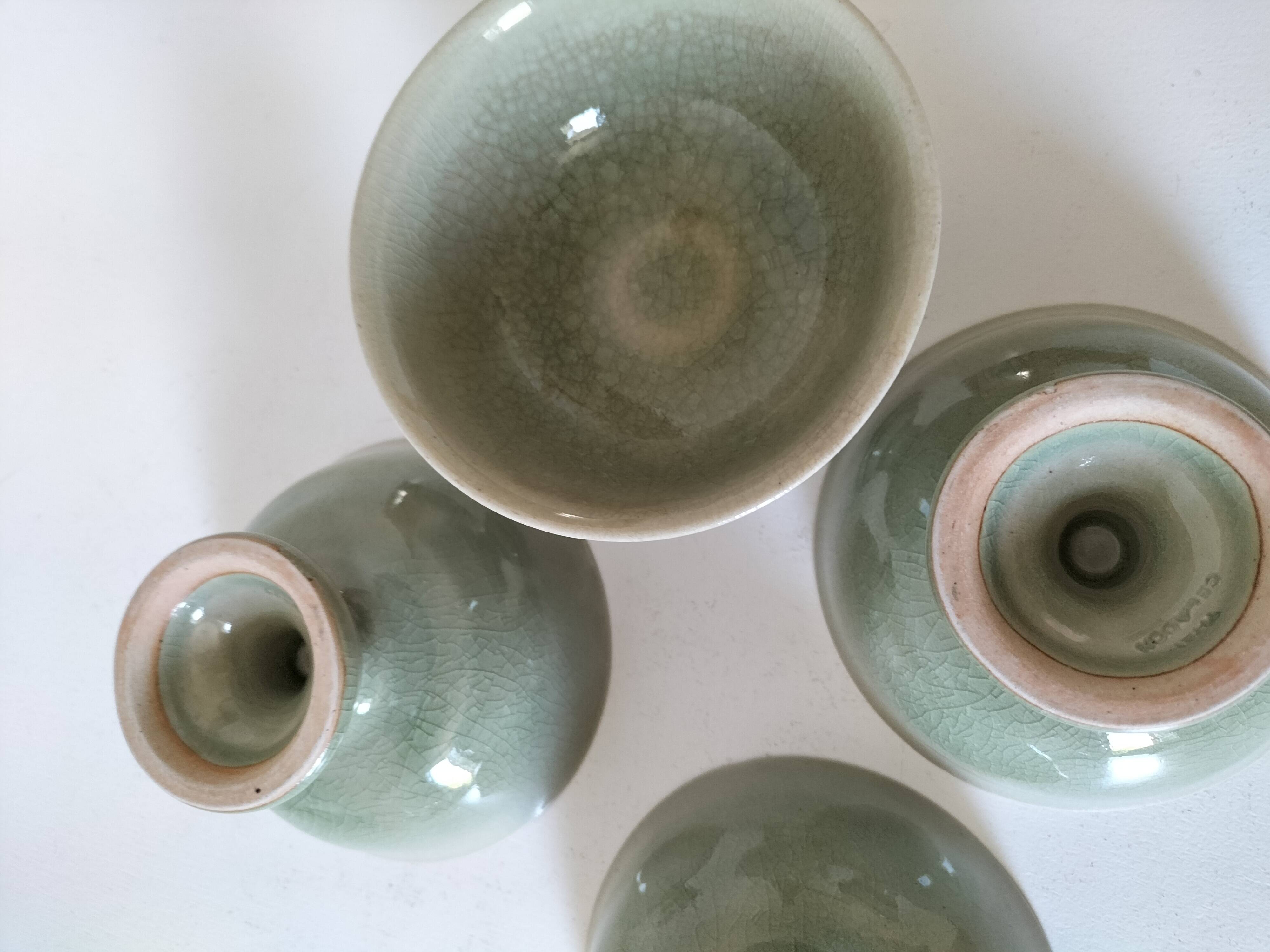 Set of 4 handmade ceramic bowls – celadon glaze & raku style