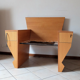 Fauteuil 1980 en bois et cuir piqûre sellier