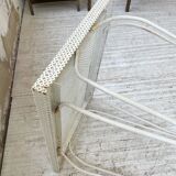 Perforated garden dining table