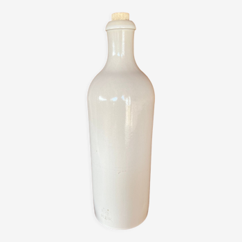 Clay-coloured stoneware bottle M.K.M
