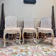 Set of six Louis XV style lacquered wood caned chairs