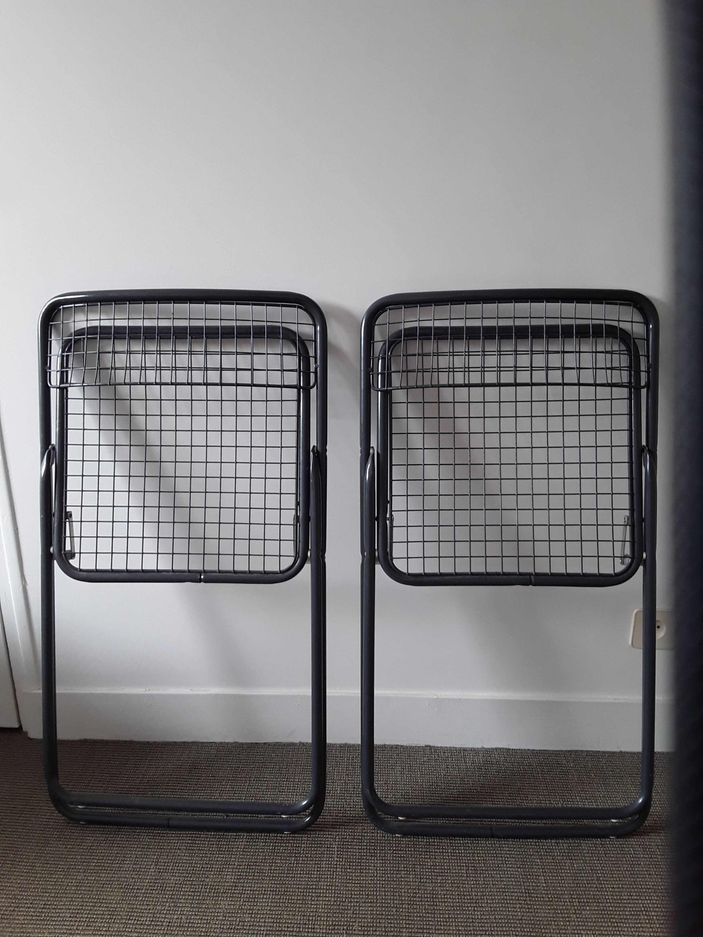 Pair of metal folding chairs