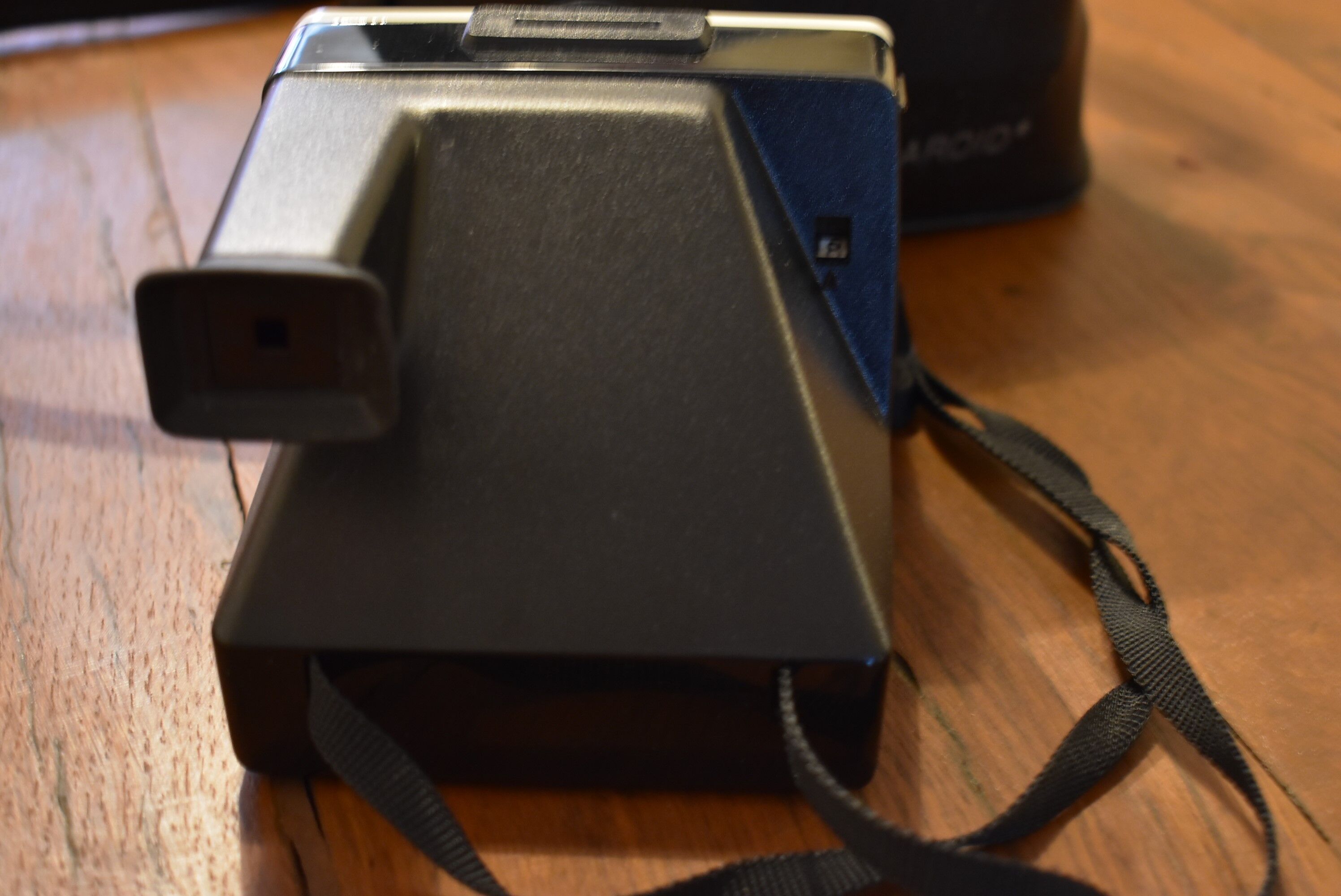 Polaroid 1000 green button