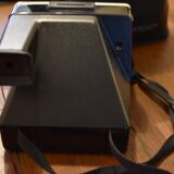 Polaroid 1000 green button