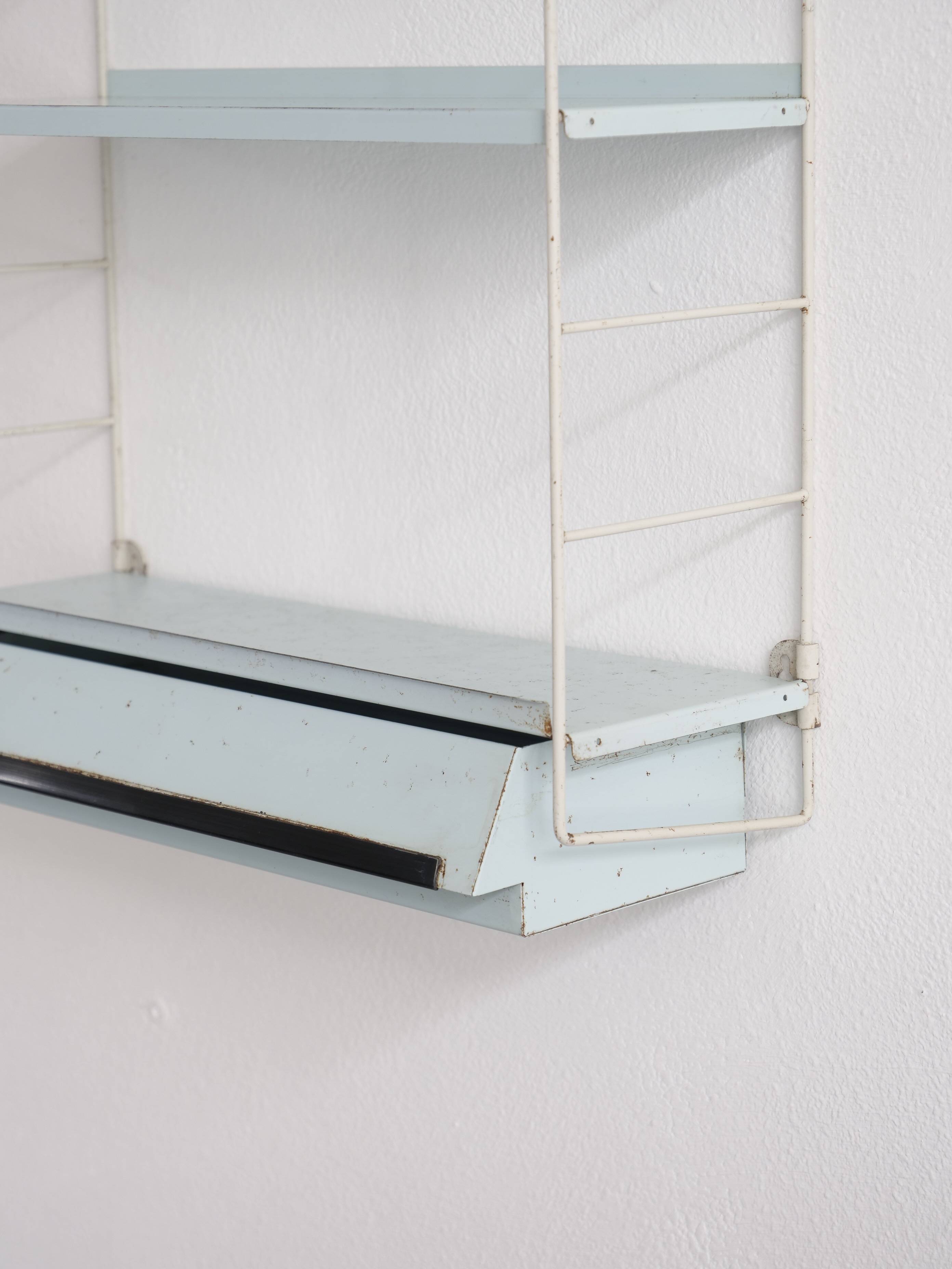 Compact tomado shelf with drawer