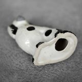 Vintage ceramic figurine from Staffordshire depicting a spaniel dog, England.