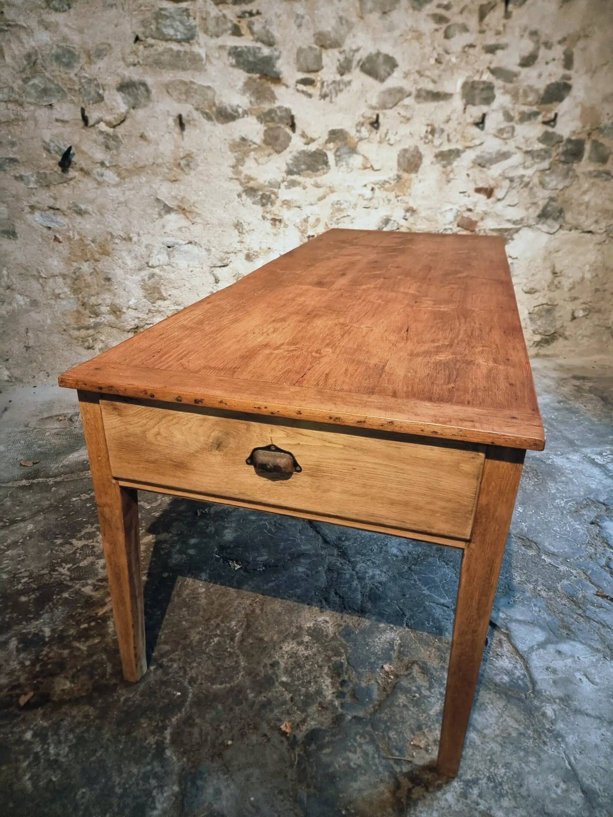 Antique French farmhouse dining table in oak and pine, circa 1900