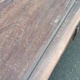 Old wooden console with chains