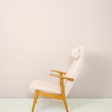 Vintage Scandinavian armchair with headrest