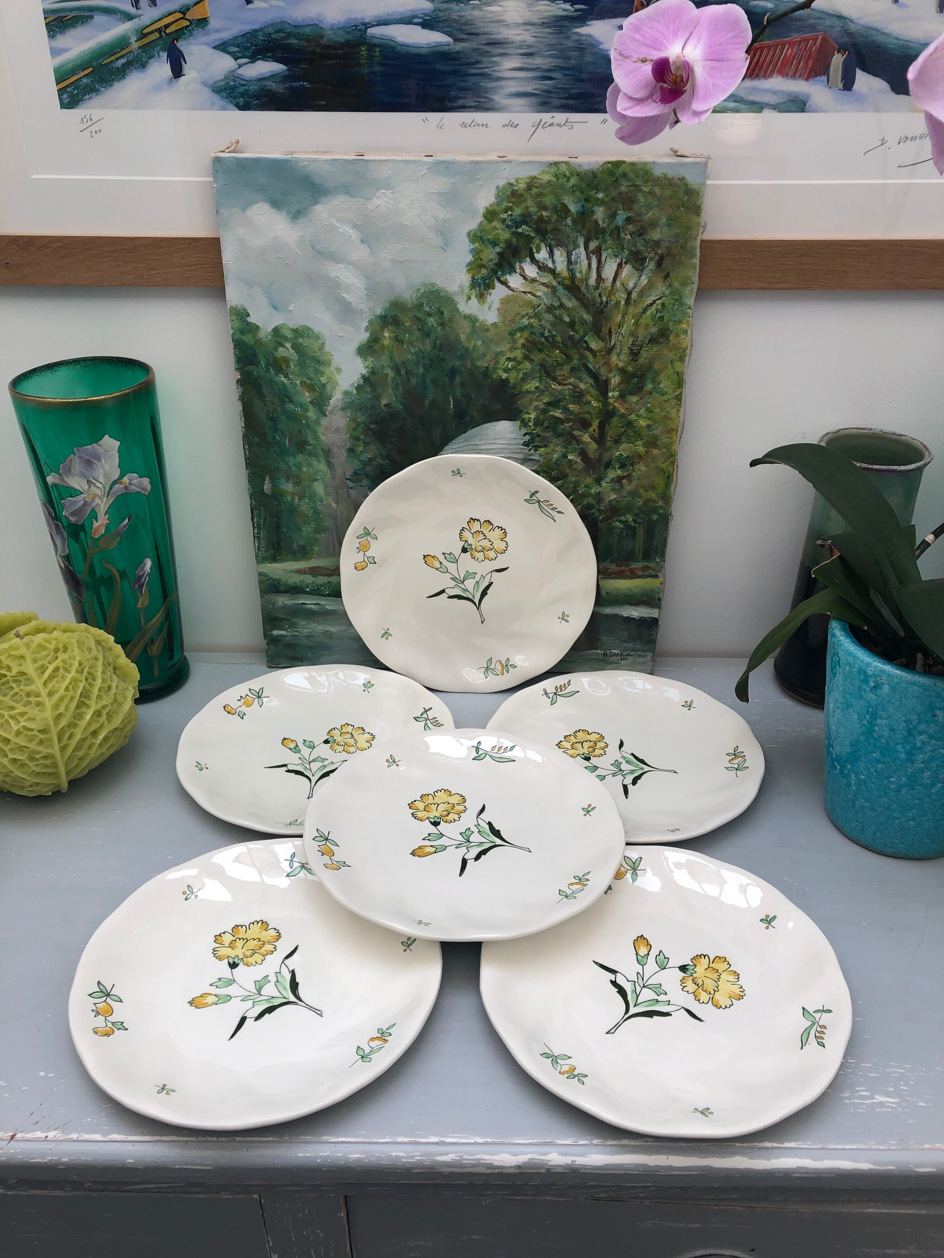 Lots of 6 flat plates model embrun, with floral motifs. Stamped Salins France