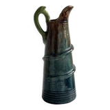 Large pitcher with frog handle.