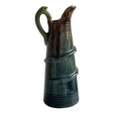 Large pitcher with frog handle.