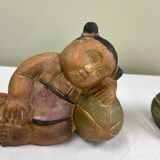 Serres-livres en bois sculpté