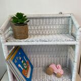 White wicker wall shelf